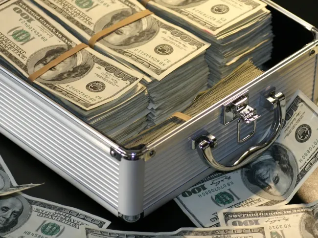 Briefcase of dollar bills